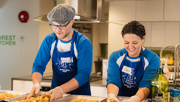 eminence team members helping out in a kitchen